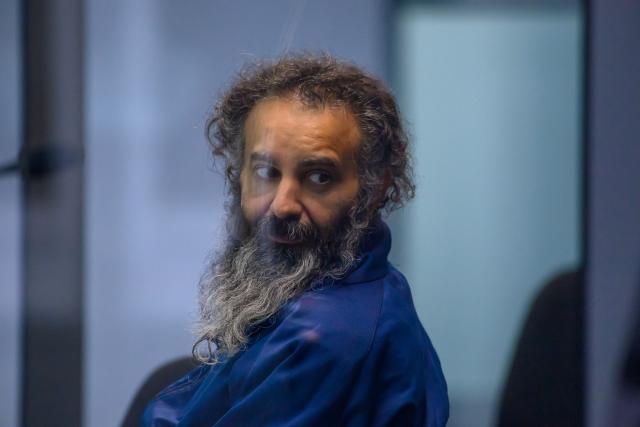 25 November 2025, Saxony-Anhalt, Magdeburg: Defendant Taleb al-Abdulmohsen sits in a bulletproof glass box at Magdeburg District Court during the trial. The public prosecutor's office is accusing the man from Saudi Arabia of 338 counts of attempted murder. On December 20, 2024, Taleb al-Abdulmohsen drove into a crowd of people at Magdeburg's Christmas market, killing 6 and injuring more than 300 people. Photo: Klaus-Dietmar Gabbert/dpa