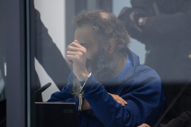 25 November 2025, Saxony-Anhalt, Magdeburg: Defendant Taleb al-Abdulmohsen sits in a bulletproof glass box at Magdeburg District Court during the trial. The public prosecutor's office is accusing the man from Saudi Arabia of 338 counts of attempted murder. On December 20, 2024, Taleb al-Abdulmohsen drove into a crowd of people at Magdeburg's Christmas market, killing 6 and injuring more than 300 people. Photo: Klaus-Dietmar Gabbert/dpa
