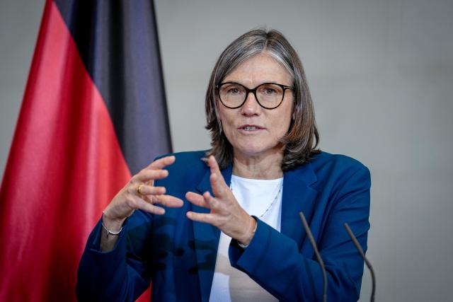 FILED - 09 October 2025, Berlin: Christiane Benner, Chairwoman of IG-Metall, speaks during a  press conference after the "car summit" at the German Chancellery in Berlin. Benner, called on companies to reaffirm their commitment to Germany as a business location, urging more optimism despite the tense economic situation. Photo: Kay Nietfeld/dpa