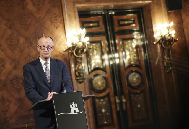 25 November 2025, Hamburg: German Chancellor Friedrich Merz makes a statement in the Kaisersaal at City Hall, during his inaugural visit to Hamburg. Photo: Christian Charisius/dpa