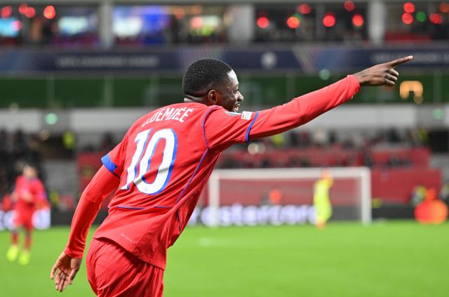 FILED - 21 October 2025, North Rhine-Westphalia, Leverkusen: Paris St. Germain's Ousmane Dembele celebrates after scoring his side's sixth goal during the UEFA Champions League soccer match between Bayer Leverkusen vs Paris Saint-Germain. Photo: Bernd Thissen/dpa