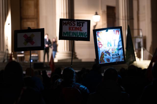 25 November 2025, Brandenburg, Potsdam: Posters are displayed during a demonstration in Potsdam marking the second anniversary of the meeting of right-wing circles. Photo: Markus Lenhardt/dpa