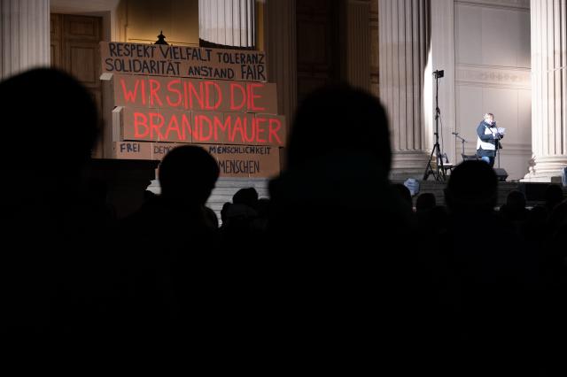 25 November 2025, Brandenburg, Potsdam: Cardboard boxes reading 'WE ARE THE BRANDMAUERS' are displayed during a demonstration in Potsdam. People gather to protest against the right on the second anniversary of the Potsdam meeting of right-wing circles. Photo: Markus Lenhardt/dpa
