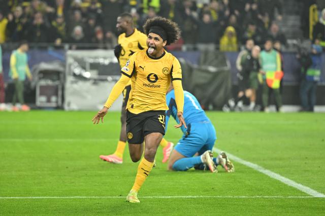 25 November 2025, North Rhine-Westphalia, Dortmund: Borussia Dortmund's Karim Adeyemi celebrates after scoring his side's third goal of the game during the UEFA Champions League soccer match between Borussia Dortmund and FC Villarreal at Signal Iduna Park. Photo: Bernd Thissen/dpa