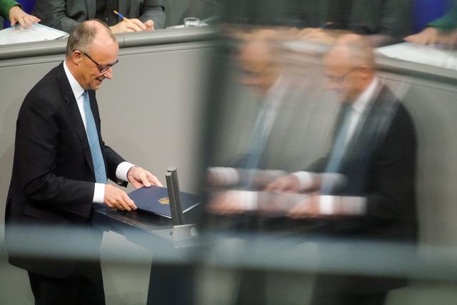 26 November 2025, Berlin: German Chancellor Friedrich Merz, takes to the lectern during the Bundestag's general debate on the budget. The debates on the budget of the Chancellor's Office are traditionally used as a general debate on the policies of the Federal Government. Photo: Kay Nietfeld/dpa