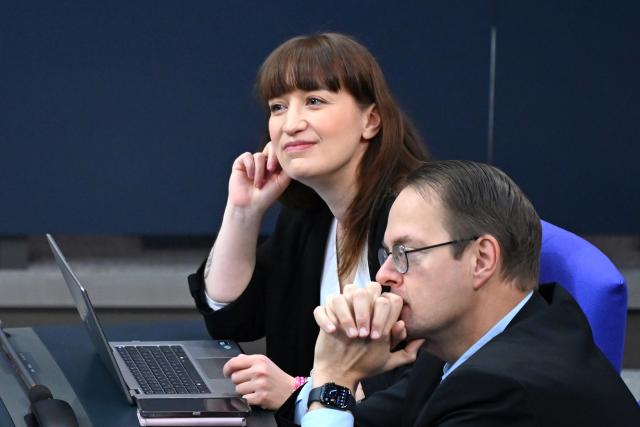 26 November 2025, Berlin: Heidi Reichinnek (L), parliamentary group leader of the Left Party, and Sören Pellmann, parliamentary group leader of the Left Party, during the general debate in the Bundestag on the budget. The debates on the budget of the Chancellor's Office are traditionally used as a general debate on the policies of the Federal Government. Photo: Elise Schu/dpa