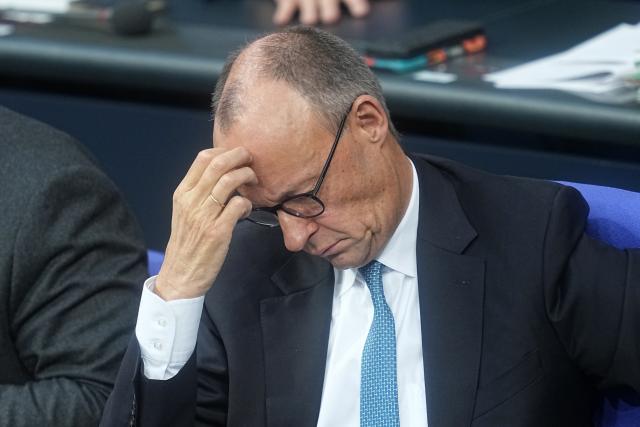 26 November 2025, Berlin: German Chancellor Friedrich Merz reacts during the general debate on the budget in the Bundestag. The debates on the budget of the Chancellery are traditionally used as a general debate on the policies of the Federal Government. Photo: Michael Kappeler/dpa