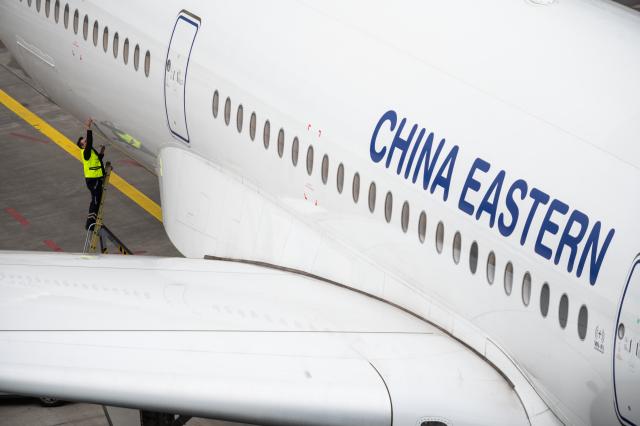 FILED - 12 March 2020, Hesse, Frankfurt/Main: An aircraft of the airline China Eastern is on the apron. Photo: Andreas Arnold/dpa