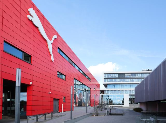 FILED - 30 October 2025, Bavaria, Herzogenaurach: A large Puma logo is displayed at the headquarters of the sporting goods manufacturer Puma. Photo: Daniel Löb/dpa