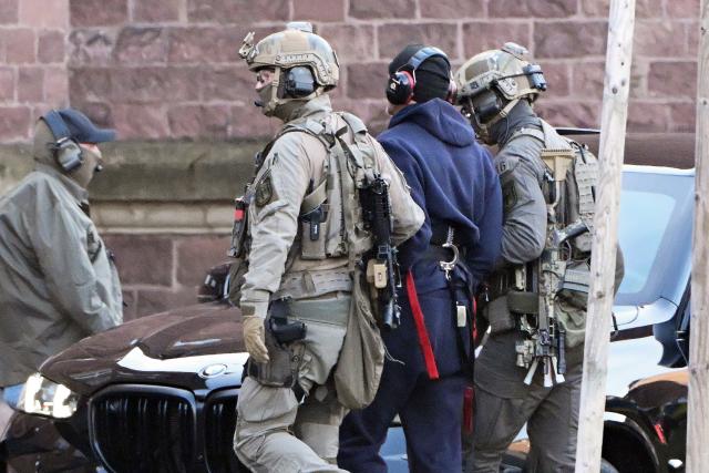 27 November 2025, Baden-Württemberg, Karlsruhe: A suspected mastermind of the attacks on the Nord Stream gas pipelines is led by officers to be transferred from Italy to Germany. He is to be brought before the investigating judge of the German Court of Justice in Karlsruhe for trial. Photo: Uli Deck/dpa