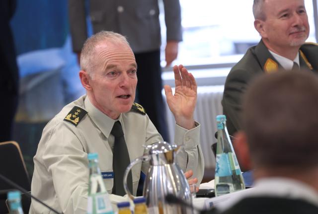 27 November 2025, Baden-Württemberg, Ulm: Dutch Lieutenant General Michiel van der Laan (L), the EU's highest military representative and Director General of the EU Military Staff, and Austrian Major General Reinhard Trischak (R), Deputy Commander of the Multinational Operational Command, sit during a meeting of European Union military commanders at the Wilhelmsburg barracks. Photo: Karl-Josef Hildenbrand/dpa