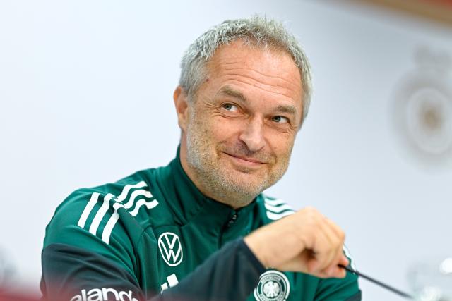 27 November 2025, Rhineland-Palatinate, Kaiserslautern: German Women's National coach Christian Wueck reacts during the team's press conference ahead of the UEFA Women's Nations League first leg soccer match against Spain. Photo: Uwe Anspach/dpa