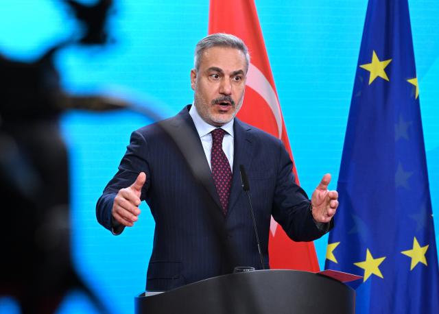 28 November 2025, Berlin: Turkish Foreign Minister Hakan Fidan speaks at the German Foreign Office during a joint press conference with Federal Foreign Minister Wadephul. Photo: Soeren Stache/dpa