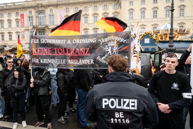 29 November 2025, Berlin: People take part in a far-right demonstration by the party Die Heimat with a banner reading "For security and order. No tolerance for criminal foreigners". Photo: Fabian Sommer/dpa
