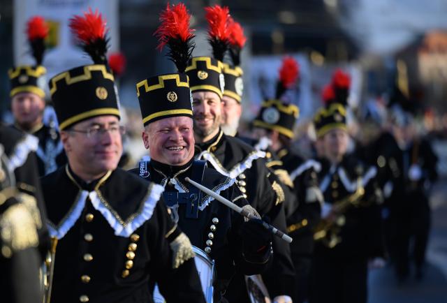 29 November 2025, Saxony, Chemnitz: Participants in a mountain parade line up in the traditional habit on Theaterplatz during the closing of the Capital of Culture Year 2025 in Chemnitz. Photo: Hendrik Schmidt/dpa