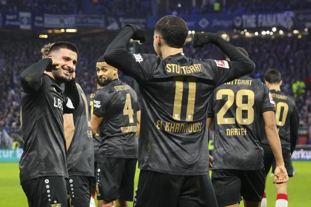 30 November 2025, Hamburg: Stuttgart's Deniz Undav (L) celebrates after scoring his side's first goal during the German Bundesliga soccer match between Hamburger SV and VfB Stuttgart at the Volksparkstadion. Photo: Christian Charisius/dpa - IMPORTANT NOTICE: DFL and DFB regulations prohibit any use of photographs as image sequences and/or quasi-video.