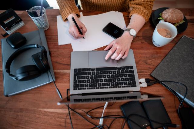 ILLUSTRATION - 19 January 2021, North Rhine-Westphalia, Oberhausen: Woman working on a laptop. Some 16% of employees in Germany believe their own job may be at risk due to artificial intelligence (AI), according to a survey released on Monday. Photo: Fabian Strauch/dpa/dpa-tmn