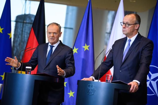 01 December 2025, Berlin: German Chancellor Friedrich Merz (R) and Polish Prime Minister Donald Tusk, hold a joint press conference on the occasion of the German-Polish government consultations at the Federal Chancellery in Berlin. Photo: Bernd von Jutrczenka/dpa
