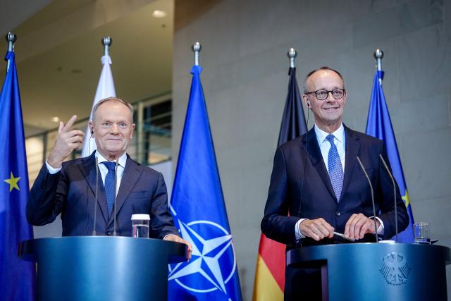 01 December 2025, Berlin: German Chancellor Friedrich Merz and Polish Prime Minister Donald Tusk (L), hold a joint press conference on the occasion of the German-Polish government consultations at the Federal Chancellery in Berlin. Photo: Kay Nietfeld/dpa