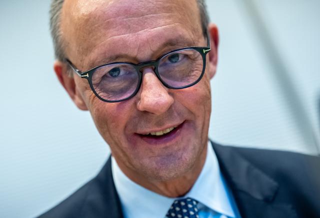 02 December 2025, Berlin: German Chancellor Friedrich Merz waits for the start of the Christian Democratic Union of Germany (CDU) and the Christian Social Union in Bavaria (CSU) parliamentary group meeting in the Bundestag. Photo: Michael Kappeler/dpa