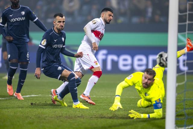 03 December 2024, North Rhine-Westphalia, Bochum: Stuttgart's Deniz Undav scores his side's second goal during the German DFB Cup round of 16 soccer match between VfL Bochum and VfB Stuttgart at Vonovia Ruhrstadion. Photo: David Inderlied/dpa - IMPORTANT NOTICE: DFL and DFB regulations prohibit any use of photographs as image sequences and/or quasi-video.