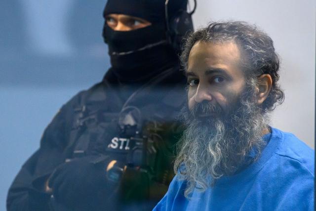 04 December 2025, Saxony-Anhalt, Magdeburg: The defendant Taleb al-Abdulmohsen sits in the glass box of the courtroom in the temporary court building at Magdeburg District Court. Photo: Klaus-Dietmar Gabbert/dpa