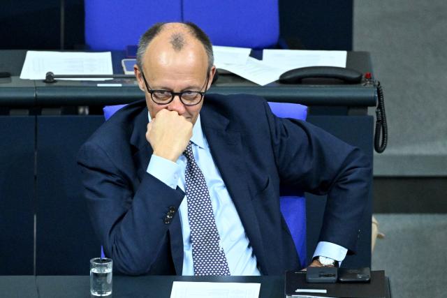 05 December 2025, Berlin: German Chancellor Friedrich Merz follows the German Bundestag session on the modernization of military service. Photo: Christophe Gateau/dpa