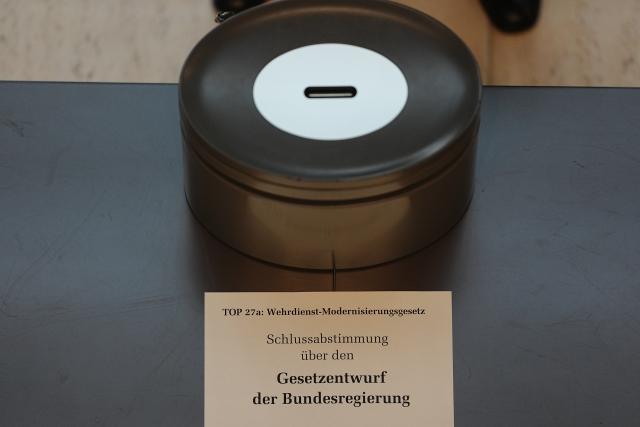 05 December 2025, Berlin: A ballot box for the roll-call vote on the draft law for a new military service stands in the German Bundestag. Photo: Kay Nietfeld/dpa