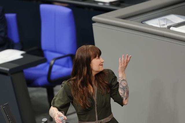 05 December 2025, Berlin: Heidi Reichinnek, parliamentary group leader of Die Linke party, reacts during the German Bundestag session on the modernization of military service. Photo: Kay Nietfeld/dpa