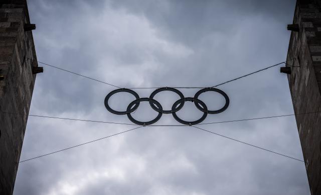 FILED - 27 May 2025, Berlin: The Olympic rings can be seen at the Olympic Stadium before the press conference to present the "Berlin+" Olympic bid. Photo: Michael Kappeler/dpa