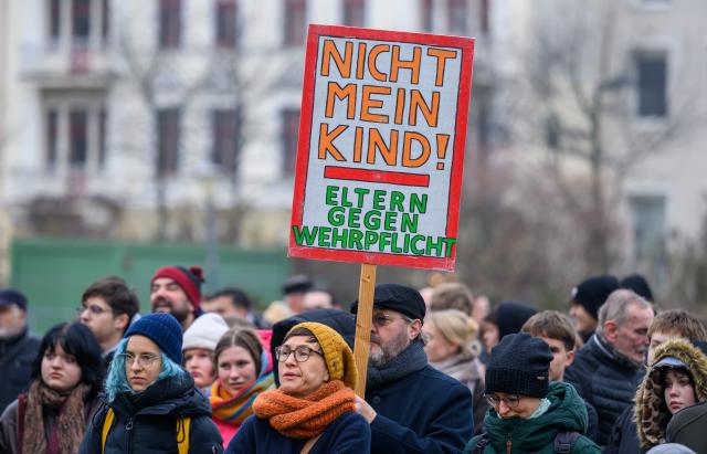 05 December 2025, Brandenburg, Cottbus: Pupils take part in the nationwide school strike and demonstrate against the introduction of compulsory military service. Photo: Patrick Pleul/dpa