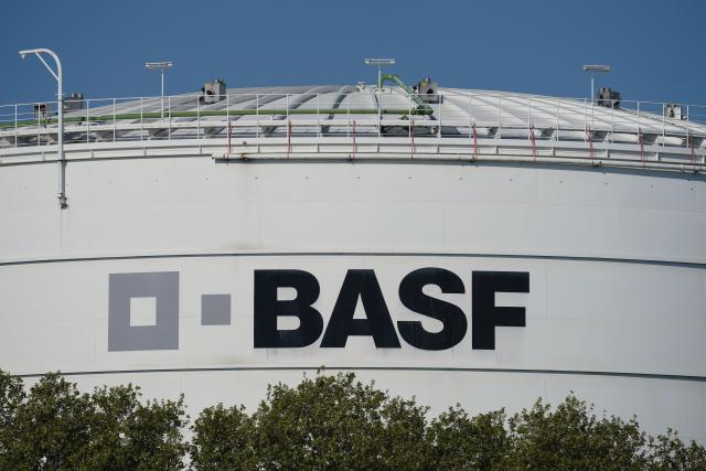 FILED - 27 April 2020, Rhineland-Palatinate, Ludwigshafen: A logo of the chemical company BASF is seen on a large storage container at the main plant. Photo: Uwe Anspach/Deutsche Presse-Agentur GmbH/dpa