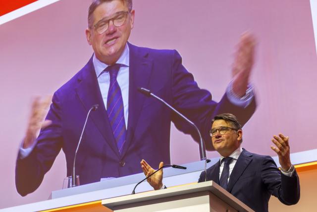 06 December 2025, Hesse, Frankfurt/Main: Hessian Minister President Boris Rhein speaks at the DOSB General Assembly in Frankfurt. The meeting is set to vote today on a bid to host the Olympic and Paralympic Games in Germany. Photo: Helmut Fricke/dpa