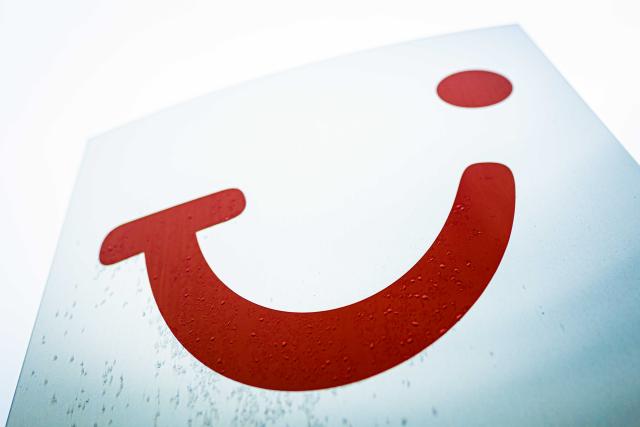 FILED - 08 February 2022, Lower Saxony, Hannover: The Tui AG logo can be seen on a sign at the company's headquarters. Photo: Moritz Frankenberg/dpa