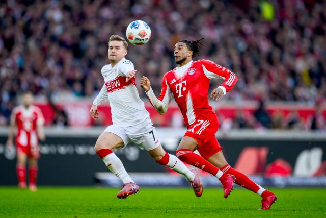 06 December 2025, Baden-Württemberg, Stuttgart: Stuttgart's Maximilian Mittelstaedt in action against Bayern Munich's Michael Olise during the German Bundesliga socce rmatch between VfB Stuttgart and FC Bayern Munich at the MHPArena. Photo: Tom Weller/dpa - IMPORTANT NOTICE: DFL and DFB regulations prohibit any use of photographs as image sequences and/or quasi-video.