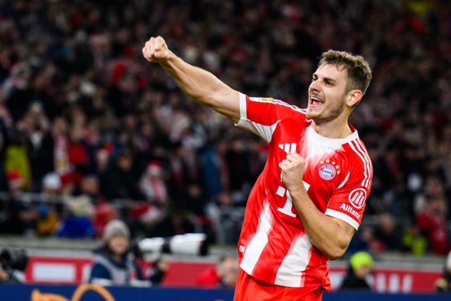 06 December 2025, Baden-Württemberg, Stuttgart: Bayern Munich's Josip Stanisic celebrates scoring his side's third goal during the German Bundesliga socce rmatch between VfB Stuttgart and FC Bayern Munich at the MHPArena. Photo: Tom Weller/dpa - IMPORTANT NOTICE: DFL and DFB regulations prohibit any use of photographs as image sequences and/or quasi-video.
