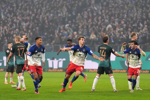 07 December 2025, Hamburg: Hamburger's Luka Vuskovic (C) celebrates scoring his side's second goal during the German Bundesliga soccer match between Hamburger SV and SV Werder Bremen at the Volksparkstadion. Photo: Marcus Brandt/dpa - IMPORTANT NOTICE: DFL and DFB regulations prohibit any use of photographs as image sequences and/or quasi-video.