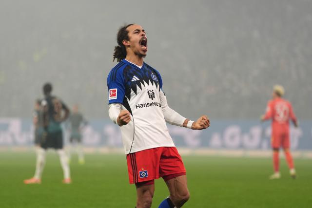 07 December 2025, Hamburg: Hamburger's Yussuf Poulsen celebrates scoring his side's third goal during the German Bundesliga soccer match between Hamburger SV and SV Werder Bremen at the Volksparkstadion. Photo: Marcus Brandt/dpa - IMPORTANT NOTICE: DFL and DFB regulations prohibit any use of photographs as image sequences and/or quasi-video.