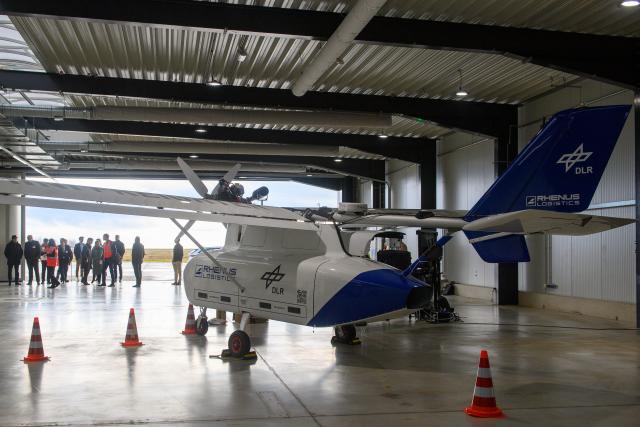08 December 2025, Saxony-Anhalt, Cochstedt: A transport drone from "Wings for Aid" stands in a hangar at the German Aerospace Center's (DLR) Test Center for Unmanned Aerial Systems. The drone can carry a payload of 160 kilograms and has a take-off mass of 650 kilograms. An event was held at the DLR Test Center for Unmanned Aircraft Systems at which DLR provided information about the prospects for drone research. Photo: Klaus-Dietmar Gabbert/dpa