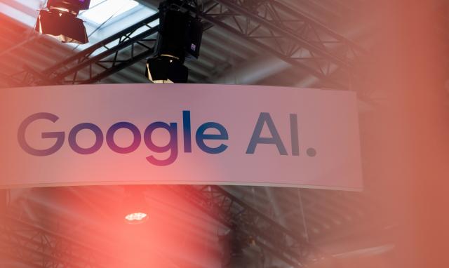 FILED - 10 September 2025, Bavaria, Munich: A sign with the inscription "Google AI" can be seen during the International Motor Show (IAA Mobility). Photo: Leonie Asendorpf/dpa