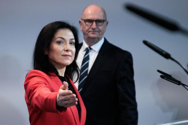 09 December 2025, Berlin: German Minister for Economic Affairs and Energy Katherina Reiche (L) and Minister President of Brandenburg Dietmar Woidke leave after a press conference about the economic and energy policy situation of the federal states of Saxony-Anhalt, Saxony and Brandenburg after a joint meeting at the Federal Ministry for Economic Affairs and Energy. Photo: Carsten Koall/dpa