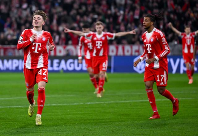 09 December 2025, Bavaria, Munich: Bayern Munich's Lennart Karl (L) celebrates a goal that was subsequently disallowed during the UEFA Champions League soccer match between Bayern Munich and Sporting Lisbon at the Allianz Arena. Photo: Sven Hoppe/dpa