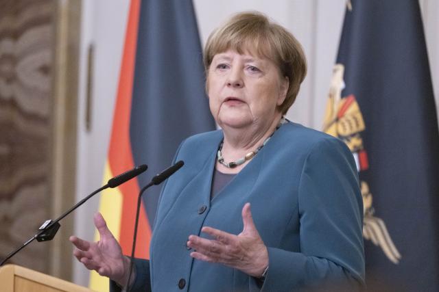 09 December 2025, Baden-Wuerttemberg, Stuttgart: Former German Chancellor Angela Merkel speaks in the New Palace after receiving the Staufer Medal in Gold for her coronavirus policy. Photo: Marijan Murat/dpa
