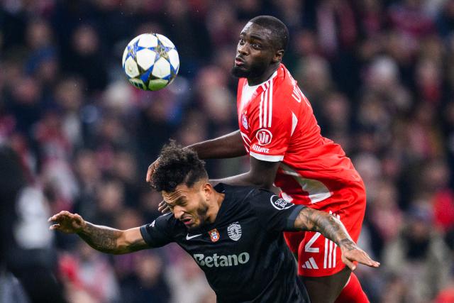 09 December 2025, Bavaria, Munich: Sporting Lisbon's Luis Suarez (L) and Bayern Munich's Dayot Upamecano battle for the ball during the UEFA Champions League soccer match between Bayern Munich and Sporting Lisbon at the Allianz Arena. Photo: Tom Weller/dpa