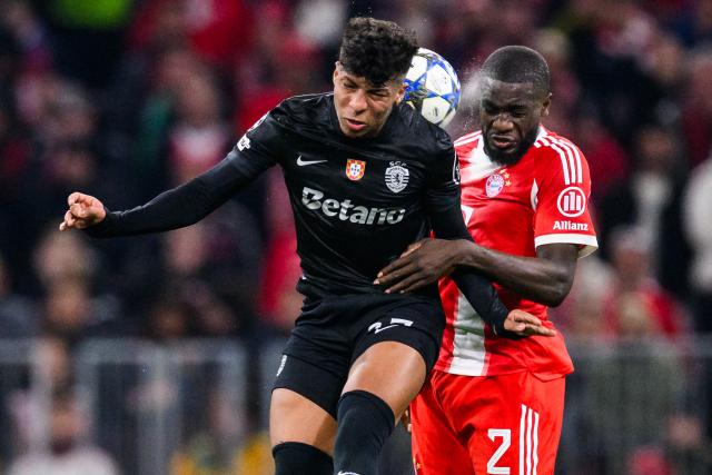 09 December 2025, Bavaria, Munich: Sporting Lisbon's Alisson Santos (L) and Bayern Munich's Dayot Upamecano battle for the ball during the UEFA Champions League soccer match between Bayern Munich and Sporting Lisbon at the Allianz Arena. Photo: Tom Weller/dpa