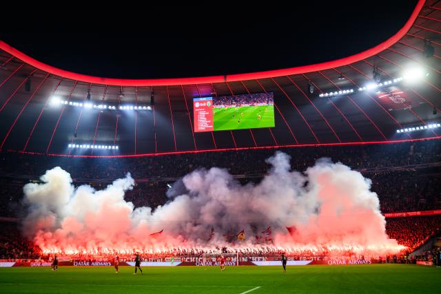 09 December 2025, Bavaria, Munich: FC Bayern Munich fans set off pyrotechnics in the stands during the UEFA Champions League soccer match between Bayern Munich and Sporting Lisbon at the Allianz Arena. Photo: Tom Weller/dpa