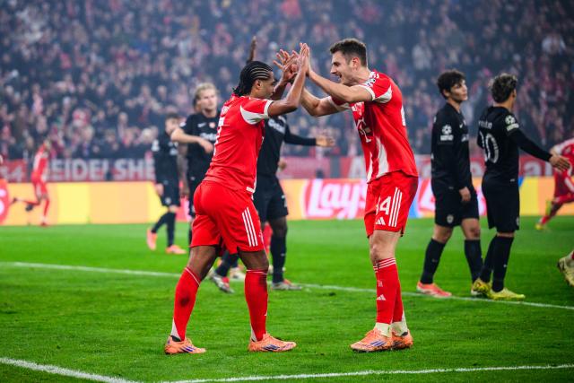 09 December 2025, Bavaria, Munich: Bayern Munich's Serge Gnabry (L) celebrates scoring his side's first goal with teammate Josip Stanisic during the UEFA Champions League soccer match between Bayern Munich and Sporting Lisbon at the Allianz Arena. Photo: Tom Weller/dpa