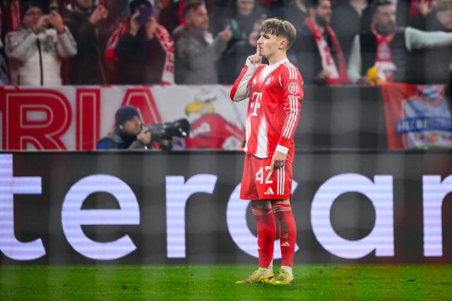 09 December 2025, Bavaria, Munich: Bayern Munich's Lennart Karl celebrates scoring his side's second goal during the UEFA Champions League soccer match between Bayern Munich and Sporting Lisbon at the Allianz Arena. Photo: Tom Weller/dpa