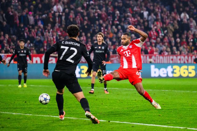 09 December 2025, Bavaria, Munich: Bayern Munich's Jonathan Tah (R) scores his side's third goal during the UEFA Champions League soccer match between Bayern Munich and Sporting Lisbon at the Allianz Arena. Photo: Tom Weller/dpa