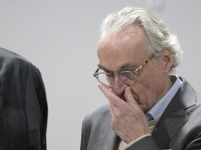 10 December 2025, Hesse, Frankfurt/Main: The main defendant, Henry XIII Prince Reuss, stands behind the dock as the trial against the alleged "Reichsbuerger" group continues. The federal prosecution accuses the nine defendants of having been members of a terrorist organization. Photo: Boris Roessler/dpa POOL/dpa